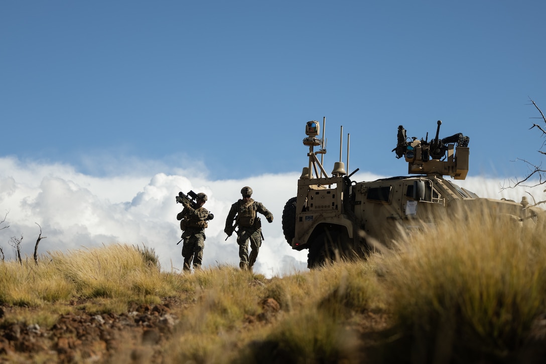 U.S. Marines with 3d Marine Division run to a firing point with a FIM-92 Stinger during a training exercise at Pohakuloa Training Area, Hawaii, Jan. 25, 2025. The training exercise taking place at PTA mirrors a Service Level Training Exercise by setting conditions for 3d MLR and its subordinate battalions to go forward to the Philippines in support of Exercise Balikatan 25 and Kamandag 9 this summer. (U.S. Marine Corps photo by Sgt. Jacqueline C. Parsons)