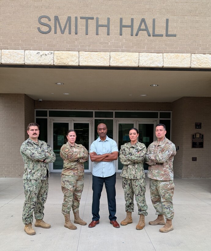 Neurodiagnostic Technologist Course. Left to Right: Hospital Corpsman 1st Class Kevin Nelson, Master Sgt. Michelle Primofiore, Mr. Clive Patterson, Hospital Corpsman 1st Class Claudia Contreras, Tech. Sgt. Alfredo Ramirez.