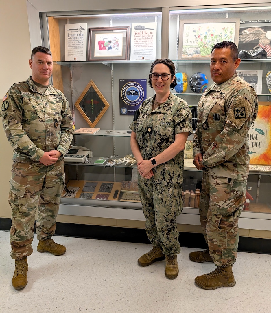 Occupational Therapy Assistant Course.
Left to Right: Sgt. 1st Class  Christopher Belieu, Lt. Cmdr. Cynthia DeArmon, Sgt. 1st Class Jose Sanchez.