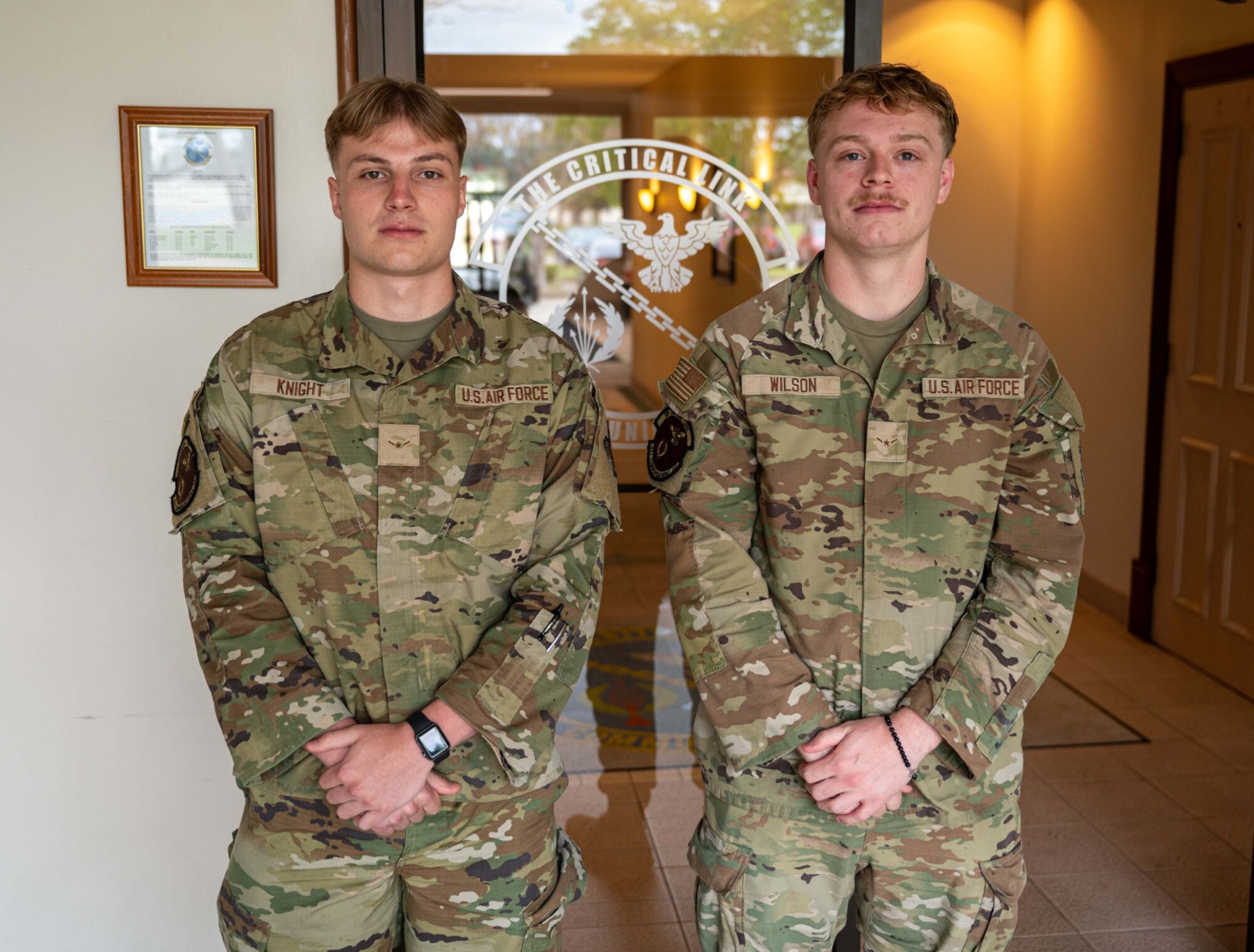 U.S. Air Force Airman Brayden Knight, left, 42nd Communications Squadron client systems technician, and Airman Brad Wilson, right, 42nd CS client systems technician, pose for a photo at Maxwell Air Force Base, Alabama, April 24, 2024.