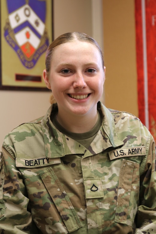 Pfc. Delaney Beatty, a joint fire control specialist with the 1st Battalion, 108th Field Artillery Regiment, 56th Stryker Brigade Combat Team, 28th Infantry Division, Pennsylvania Army National Guard, poses for a photograph April 26, 2025, at the Carlisle Readiness Center in Carlisle, Pennsylvania. Beatty recently graduated advanced individual training as distinguished honor graduate. (U.S. Army National Guard photo by 1st Lt. Ashley Childress)