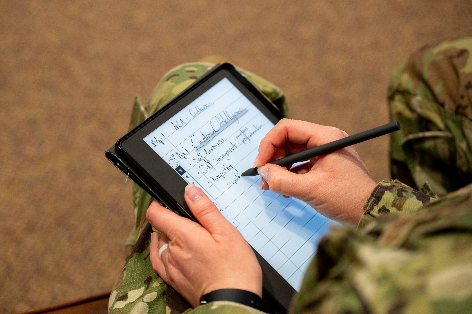 U.S. Air Force Tech. Sgt. Audra Chambers, 436th Healthcare Operations Squadron family health clinic noncommissioned officer in charge, takes notes during Airpower Leadership Academy at Dover Air Force Base, Delaware, April 18, 2025. ALA is a professional development program for NCOs to develop leadership abilities in areas of personal and value-based philosophy. (U.S. Air Force photo by Senior Airman Trenten Walters)