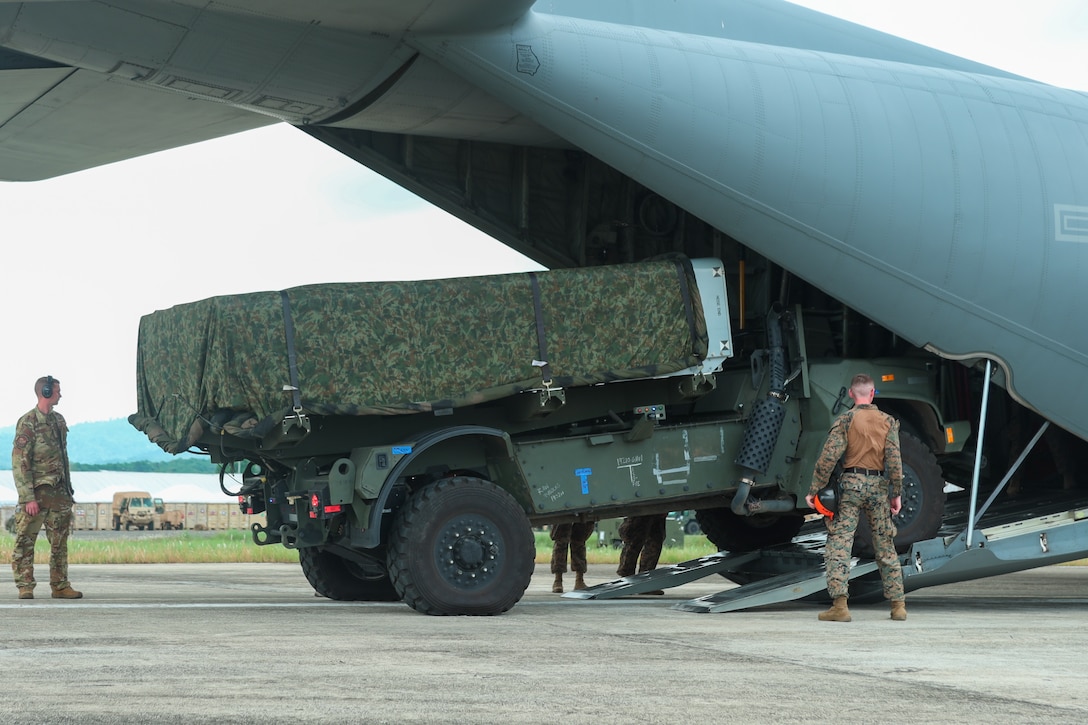U.S. Marines with Medium-Range Missile Battery, 3d Littoral Combat Team, 3d Marine Littoral Regiment, 3d Marine Division load a Navy-Marine Expeditionary Ship Interdiction System onto a U.S. Air Force C-130J Super Hercules assigned to 39th Airlift Squadron during Exercise Balikatan 25 at Lal-lo, Philippines, April 26, 2025. This marks the inaugural deployment of the newly fielded Marine Corps weapon system to the Philippines and serves as a major milestone for the continuously developing U.S.-Philippines Alliance. Balikatan is a longstanding annual exercise between the Armed Forces of the Philippines and U.S. military designed to strengthen our ironclad alliance, improve our capable combined force, and demonstrate our commitment to regional security and stability. (U.S. Marine Corps photo by Chief Warrant Officer 2 Trent Randolph)