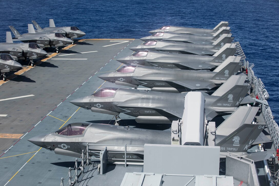 U.S. Marine Corps F-35B Lightning II aircraft with Marine Fighter Attack Squadron 121 stage aboard the amphibious assault carrier USS Tripoli (LHA 7) during Valiant Shield 2022 (VS22)