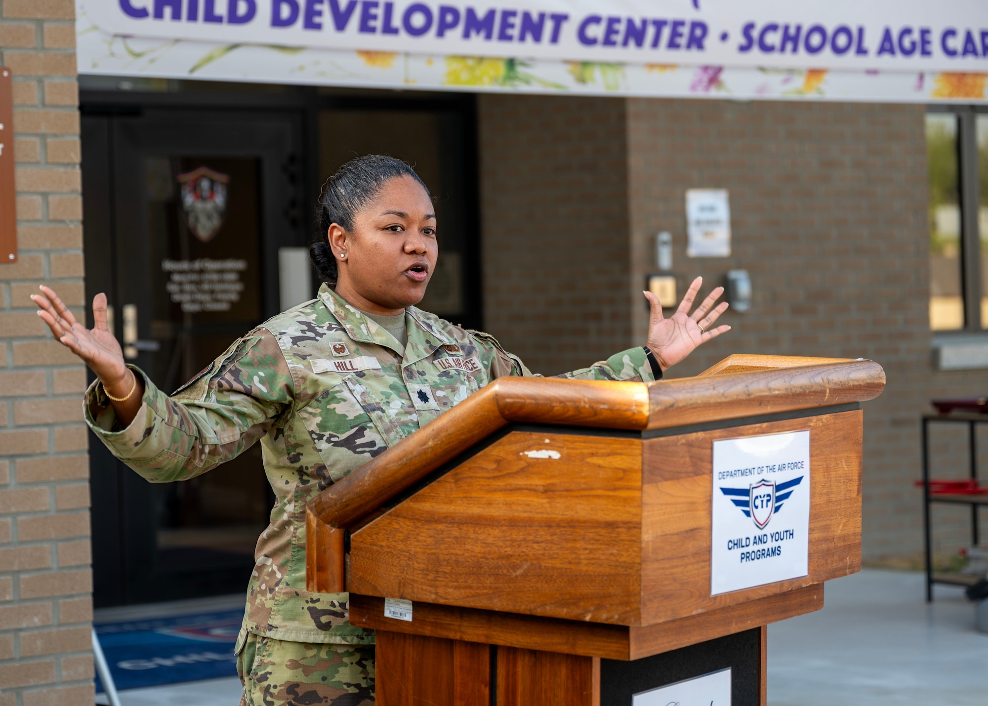 U.S. Air Force Lt. Col. Annabelle Hill, 51st Force Support Squadron commander, delivers remarks during the opening ceremony for the new Child Development Center at Osan Air Base, Republic of Korea, April 24, 2025. The new facility combined the child development center and school-aged care facility, nearly doubling available childcare slots. (U.S. Air Force photo by Senior Airman Sarah Williams)