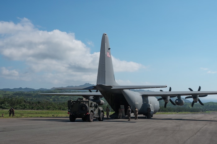 A U.S. Marine Corps Joint Light Tactical Vehicle with leader kit assigned to Medium-Range Missile Battery, 3d Littoral Combat Team, 3d Marine Littoral Regiment, 3d Marine Division offloads from a U.S. Air Force C-130J Super Hercules assigned to 39th Airlift Squadron during Exercise Balikatan 25 at Basco, Philippines, April 26, 2025. This marks the inaugural deployment of the newly fielded Marine Corps weapon system to the Philippines and serves as a major milestone for the continuously developing U.S.-Philippines Alliance. Balikatan is a longstanding annual exercise between the Armed Forces of the Philippines and U.S. military designed to strengthen our ironclad alliance, improve our capable combined force, and demonstrate our commitment to regional security and stability. (U.S. Marine Corps photo by Chief Warrant Officer 2 Trent Randolph)