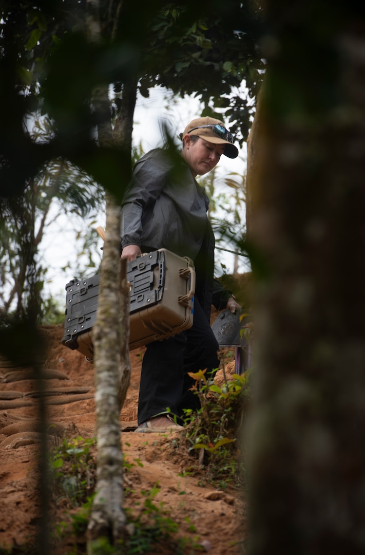 Dr. Larkin Kennedy, a scientific recovery expert with the Defense POW/MIA Accounting Agency, hikes to an excavation area and prepares for the start of recovery operations in Vietnam, March 9, 2025. U.S.