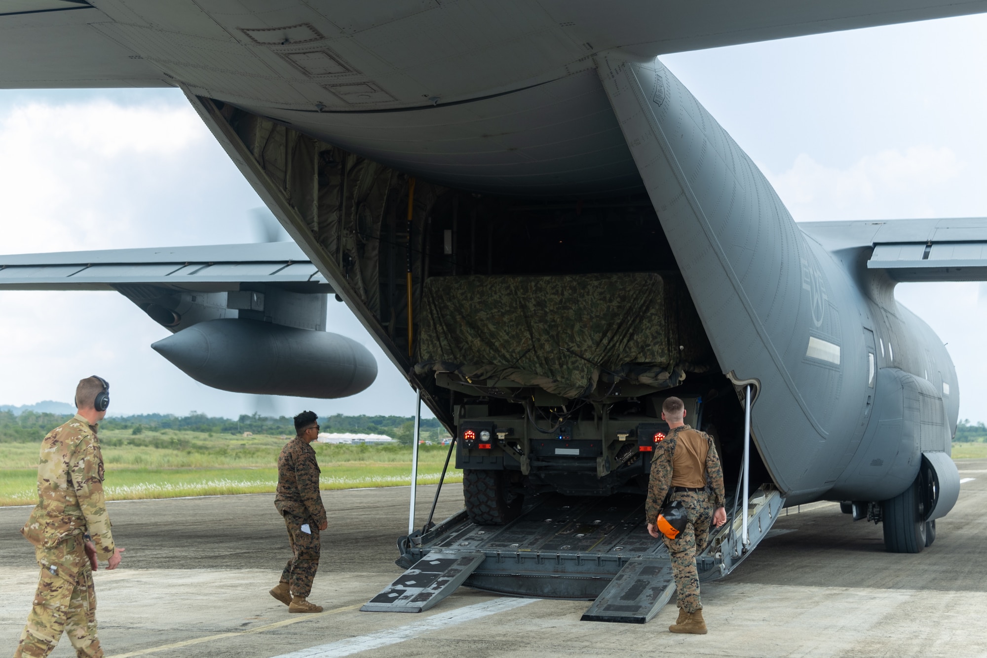 U.S. Marines with Medium-Range Missile Battery, 3d Littoral Combat Team, 3d Marine Littoral Regiment, 3d Marine Division load a Navy-Marine Expeditionary Ship Interdiction System onto a U.S. Air Force C-130J Super Hercules assigned to 39th Airlift Squadron during Exercise Balikatan 25 at Lal-lo, Philippines, April 26, 2025. This marks the inaugural deployment of the newly fielded Marine Corps weapon system to the Philippines and serves as a major milestone for the continuously developing U.S.-Philippines Alliance. Balikatan is a longstanding annual exercise between the Armed Forces of the Philippines and U.S. military designed to strengthen our ironclad alliance, improve our capable combined force, and demonstrate our commitment to regional security and stability. (U.S. Marine Corps photo by Chief Warrant Officer 2 Trent Randolph)