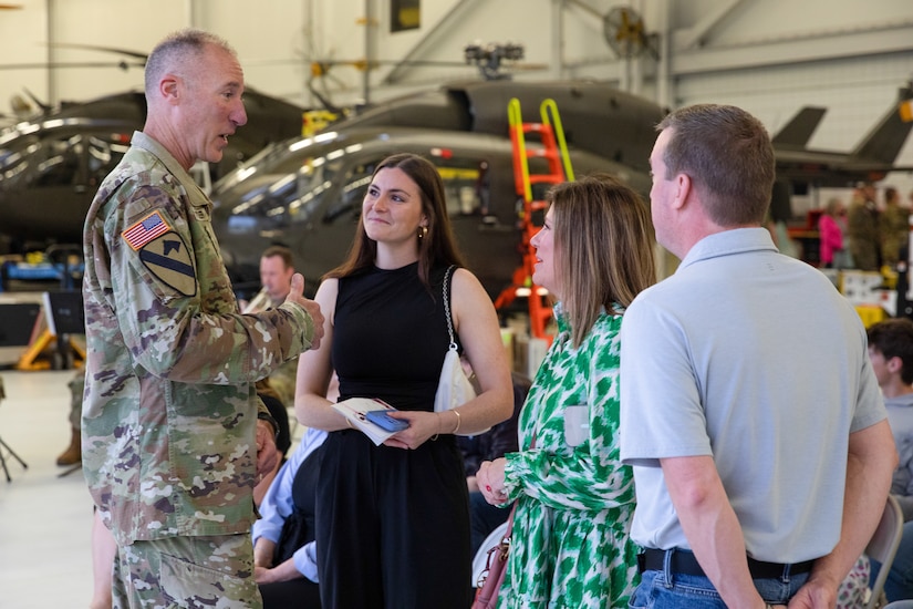 Brig. Gen. Brian Wertzler, Deputy Adjutant General, Kentucky Army National Guard, speaks with families of deploying Soldiers on April 25, 2025 in Frankfort, Kentucky. Approximately 30 Soldiers from the 2-238th are deploying to Europe in support of intratheater aeromedical evacuations. (U.S. Army National Guard photo by Sgt. First Class Ryan Wilhoit)