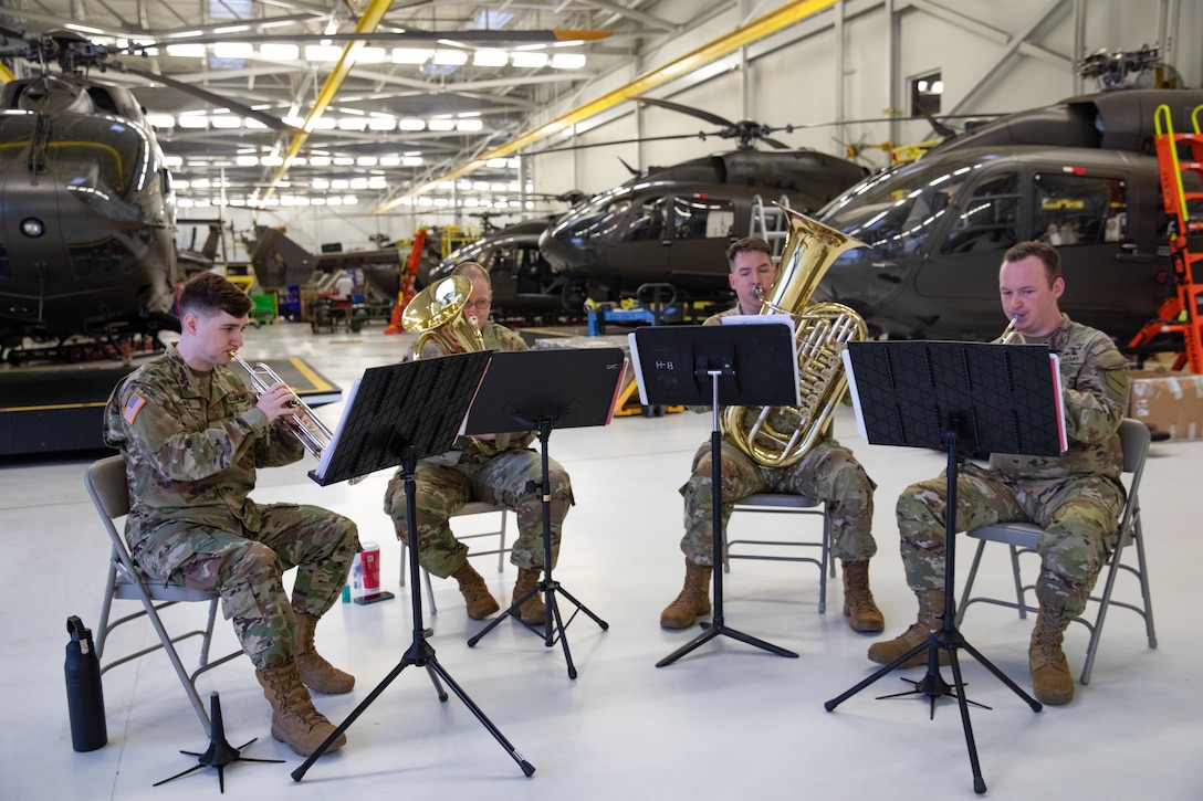 Members of the 202nd Army Band provided the ceremonial music for the 2-238th deployment ceremony on April 25, 2025 in Frankfort, Kentucky. Approximately 30 Soldiers from the 2-238th are deploying to Europe in support of intratheater aeromedical evacuations. (U.S. Army National Guard photo by Sgt. First Class Ryan Wilhoit)