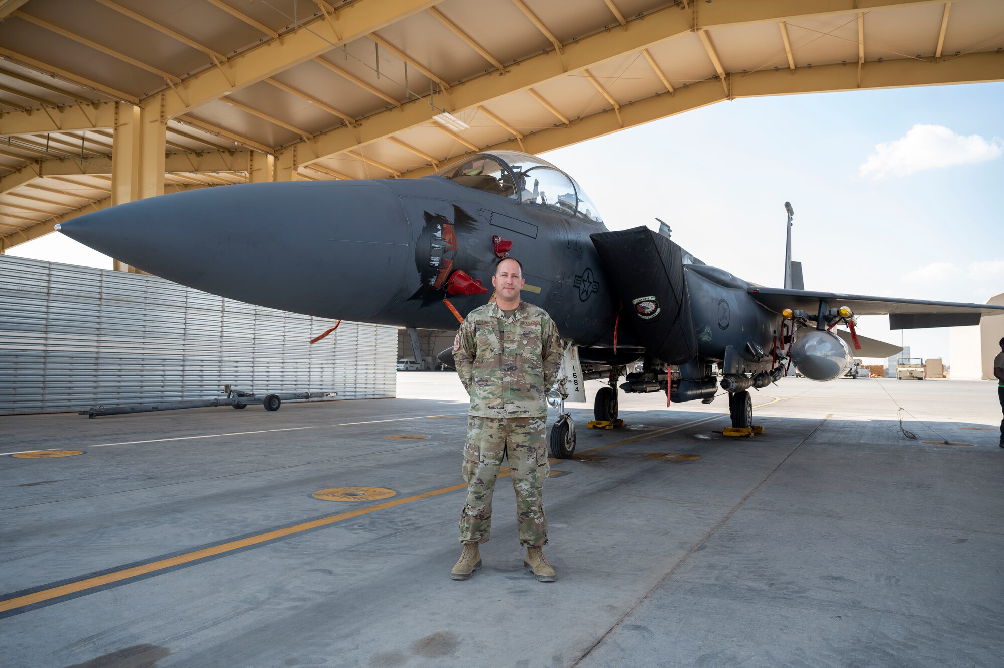 U.S. Air Force Senior Master Sgt. Isaac Lambuth, a section chief assigned to the 335th Expeditionary Fighter Squadron, poses for a photo at an undisclosed location within the U.S. Central Command area of responsibility on July 15, 2024. Lambuth is a key player in training Airmen in integrated combat turns; taking the ICT teams, along with several other agencies to austere agile combat employment locations during major Wing exercises. (U.S. Air Force photo)