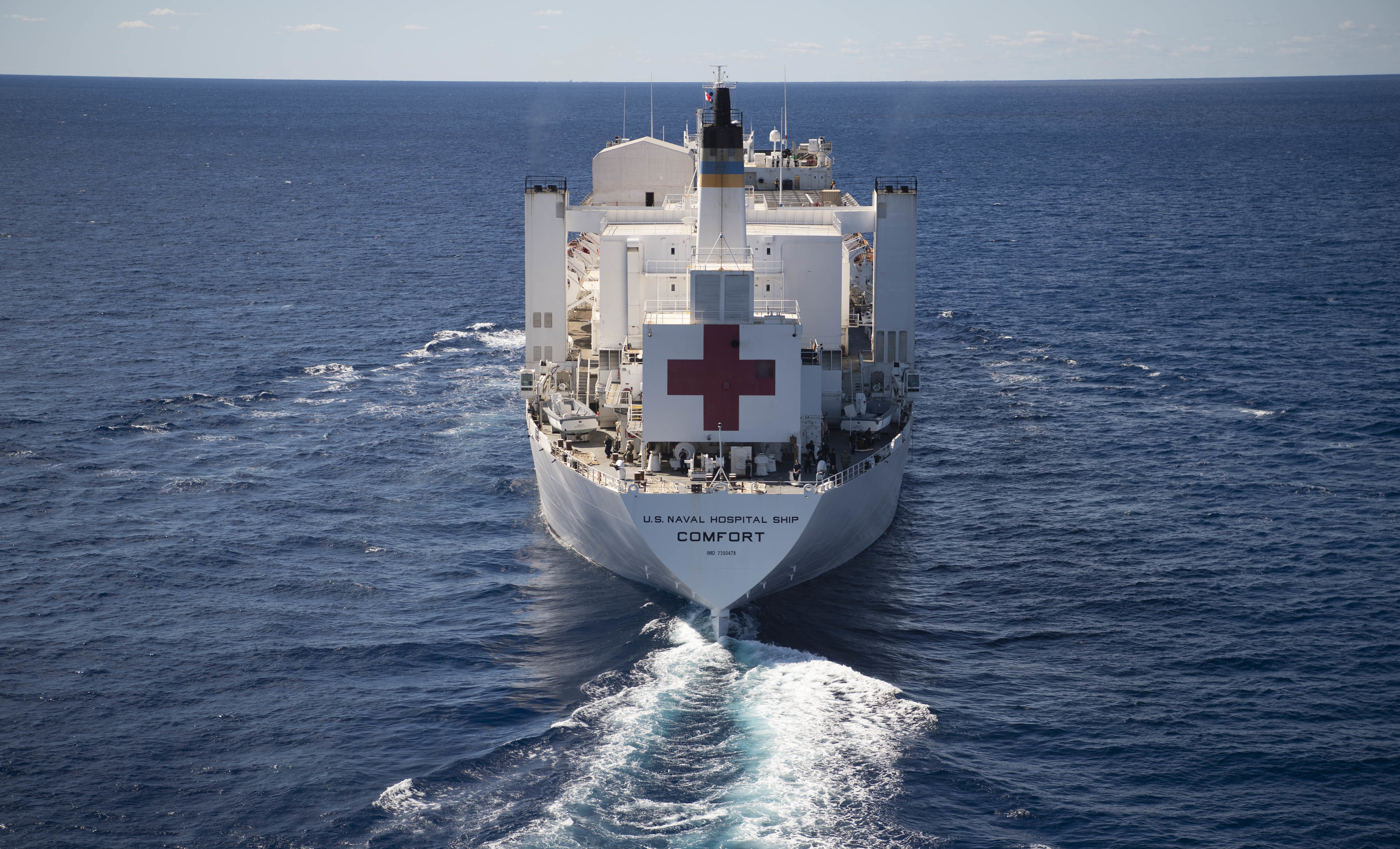 221021-N-MY642-1179

ATLANTIC OCEAN (October 21, 2022) The hospital ship USNS Comfort (T-AH 20) steams through the ocean as part of the transit south from Nofolk, Va. Comfort is deployed to U.S. 4th Fleet in support of Continuing Promise 2022, a humanitarian assistance and goodwill mission conducting direct medical care, expeditionary veterinary care, and subject matter expert exchanges with five partner nations in the Caribbean, Central and South America. (U.S. Navy photo by Mass Communication Specialist 1st Class Donald R. White Jr.)