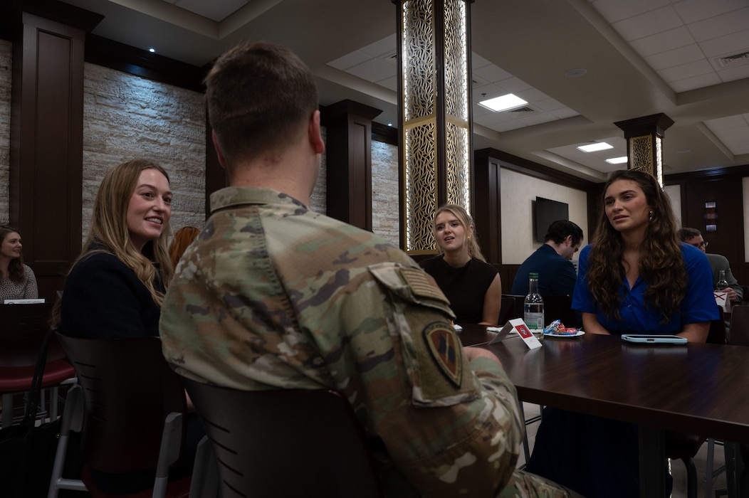 A U.S. Air Force Airman speaks with staff members of the U.S. Senate and the House of Representatives during a visit within the U.S. Central Command area of responsibility, April 14, 2025. The visit allowed the staff members to see how vital U.S. CENTCOM's collaborations are to carrying out its regional responsibilities (U.S. Air Force photo by Senior Airman Dieondiere Jefferies)