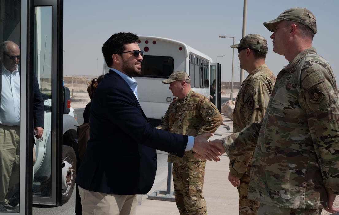 The 379th Air Expeditionary Wing leadership team greets staff members of the U.S. Senate and House of Representatives during a visit within the U.S. Central Command area of responsibility, April 14, 2025. During the visit the staff members learned about the importance of U.S. CENTCOM's partnerships within its area of responsibility. (U.S. Air Force photo by Senior Airman Dieondiere Jefferies)