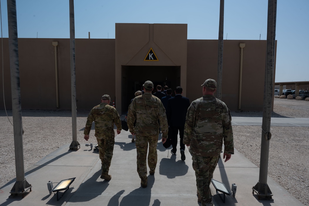 The 379th Air Expeditionary Wing Leadership team escorts staff members of the U.S. Senate and House of Representatives during a visit within the U.S. Central Command area of responsibility, April 14, 2025. During the visit the staff members learned about the importance of U.S. CENTCOM's partnerships within its area of responsibility. (U.S. Air Force photo by Senior Airman Dieondiere Jefferies)