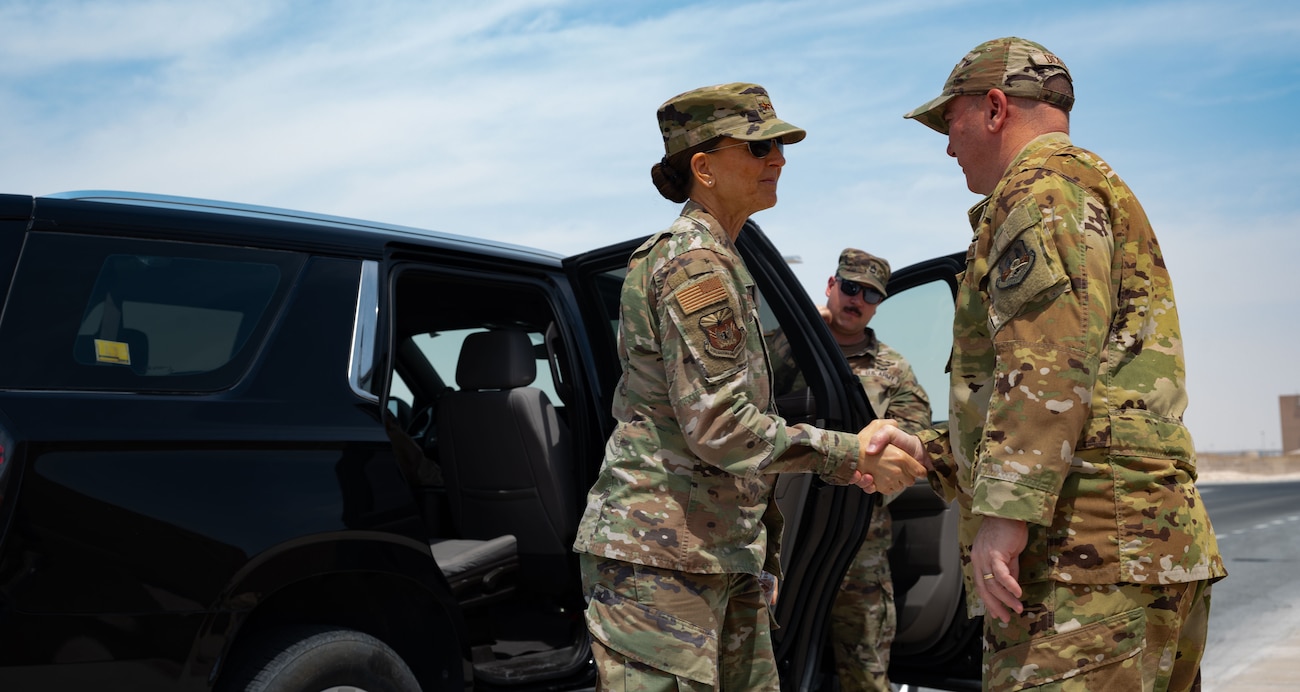 U.S. Air Force Brig. Gen. Richard Dickens, right, 379th Air Expeditionary Wing commander, greets Maj. Gen. Kerry L. Muehlenbeck, Adjutant General of Arizona, during a visit within the U.S. Central Command area of responsibility, April 2, 2025. The 379th AEW is the largest and most diverse wing within Air Forces Central (AFCENT) and serves as the regional epicenter of power projection. (U.S. Air Force photo by Senior Airman Dieondiere Jefferies)