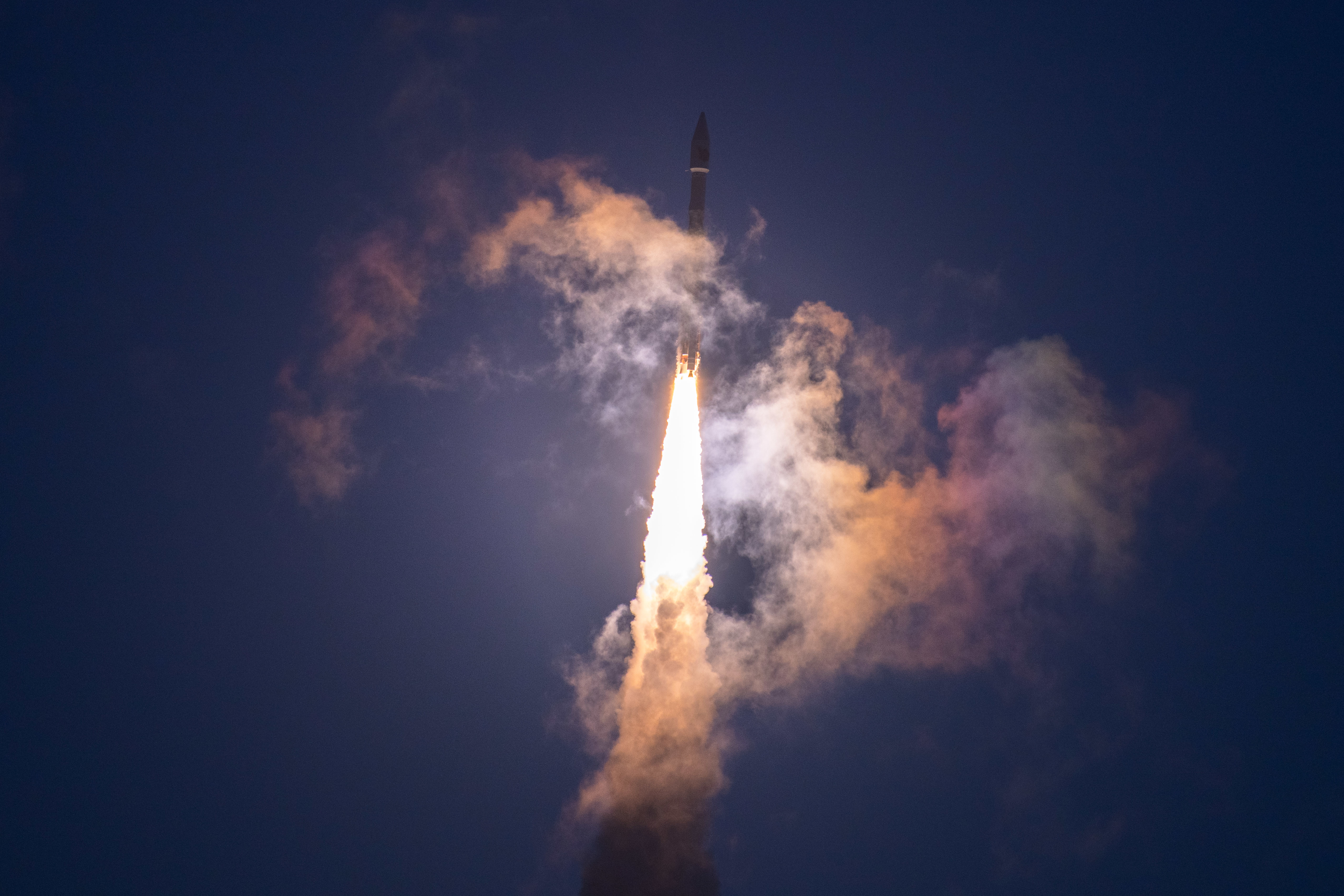 Photo shows a rocket launching into space.
