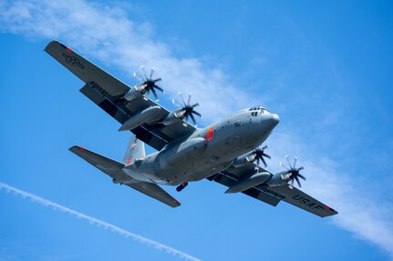 A C-130 (MAFFS 5) from the United States Air Force Reserve's 302nd Airlift Wing out of Colorado Space Force Base does a dry run before performing a water drop April 24, 2025