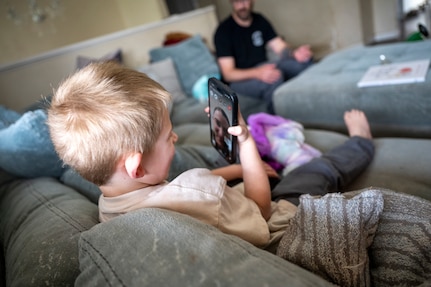 Tech. Sgt. Megan Brasley, a deployed aircraft vehicle data operations specialist originally assigned to the 124th Maintenance Group, Idaho Air National Guard, FaceTimes with her sons Ryker and Rhett.
