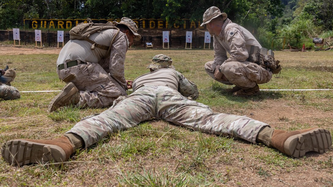 U.S. Marines with 1st Battalion, 8th Marines, 6th Regiment, 2d Marine Division advise a Panamanian security force member on how to zero his rifle in Horoko, Panama, April 19, 2025. U.S. Southern Command is focused on increasing partner nation capacity and interoperability in the region and reflects the United States’ enduring promise of friendship, partnership, and solidarity with the Panamanian people. (U.S. Marine Corps photo by Lance Cpl. Francis Hrosar)