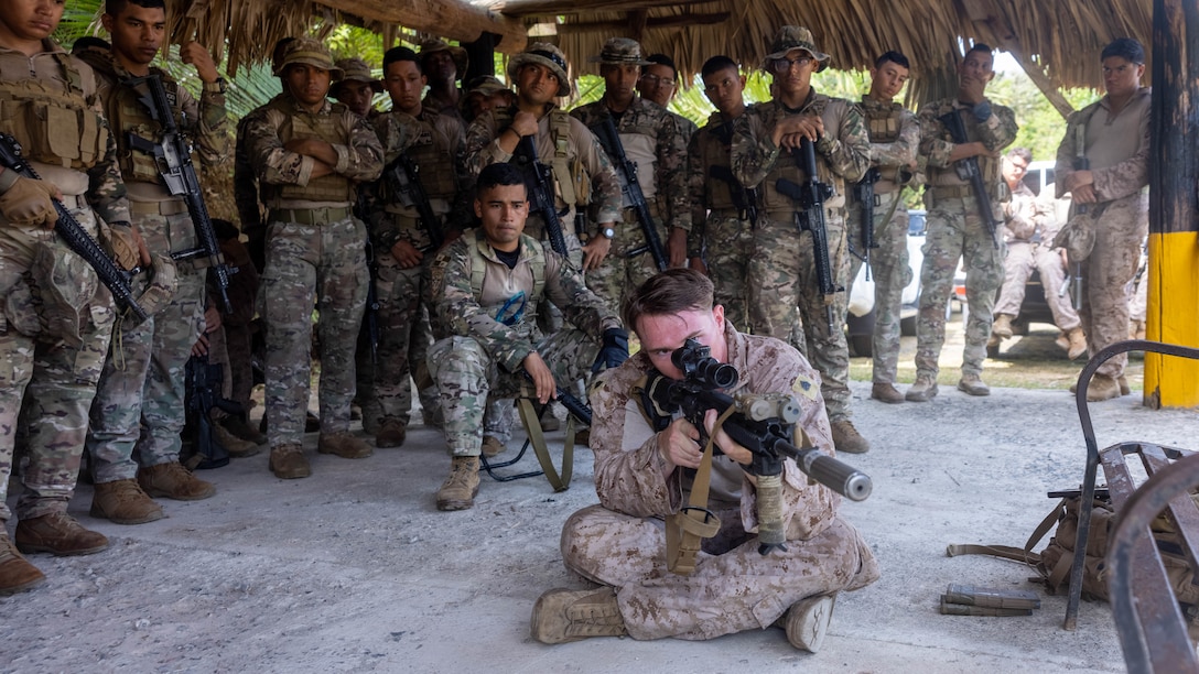U.S. Marine Sgt. David Gattine, a Macomb, Michigan native and scout sniper with 1st Battalion, 8th Marines, 6th Regiment, 2d Marine Division teaches a class on how zero a rifle to Panamanian security forces in Horoko, Panama, April 19, 2025. U.S. Southern Command is focused on increasing partner nation capacity and interoperability in the region and reflects the United States’ enduring promise of friendship, partnership, and solidarity with the Panamanian people. (U.S. Marine Corps photo by Lance Cpl. Francis Hrosar)