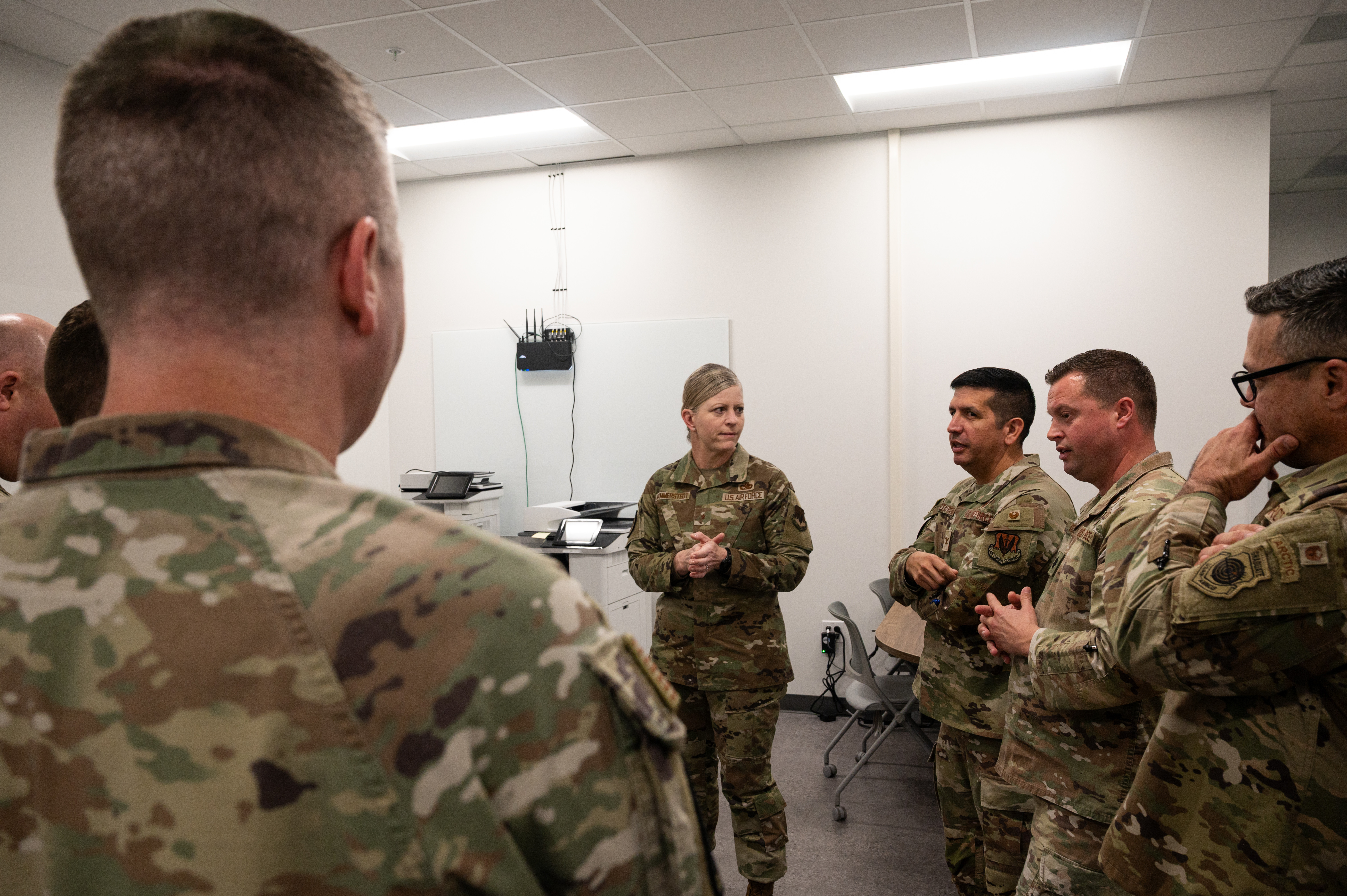 U.S. Air Force leaders brief Brig. Gen. Jennifer Hammerstedt, Air Combat Command (ACC) director of logistics, engineering, and force protection, and Airmen attending the 2025 Combat Air Forces Logistics Tactical Conference (LOGTAC) on the day's events at Nellis Air Force Base, Nevada, April 15, 2025. LOGTAC helps to determine the modernization of agile combat employment efforts around the world. This was the first time LOGTAC was hosted by ACC at Nellis and gives leaders the opportunity to provide insight regarding the future of logistics. (U.S. Air Force photo by Airman 1st Class Michael Sanders)