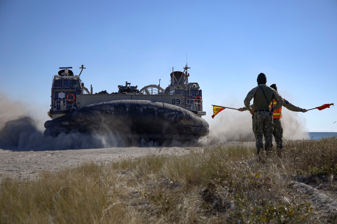A U.S. Navy Landing Craft Air Cushion carries Marines with the 24th Marine Expeditionary Unit (Special Operations Capable) to shore on Onslow Beach, North Carolina, Dec. 2, 2024. The Marines with the 24th MEU (SOC) return to Camp Lejeune following a 7-month long deployment to U.S. Naval Forces Europe and Africa area of operation. Embarked on the Navy’s Wasp Amphibious Ready Group, the 24th MEU (SOC) supported U.S. Allied, and partner interests in the region, including the Eastern Mediterranean Sea, to promote regional stability and deter aggression. (U.S. Marine Corps photo by Sgt. Michele Clarke)