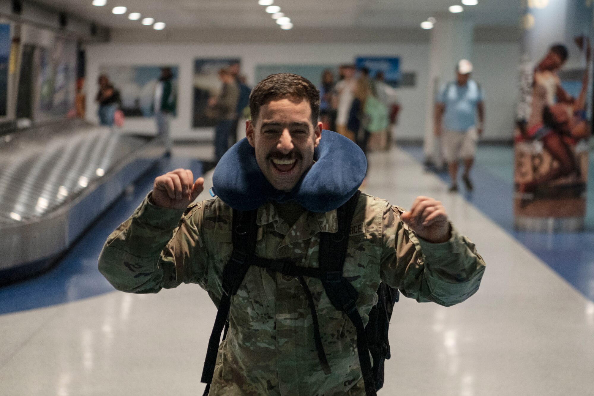 U.S. Air Force Tech. Sgt. Jose Diaz, cyber operations technician, 141st Air Control Squadron, Puerto Rico Air National Guard, arrives at the Luis Muñoz Marin International Airport, Carolina, Puerto Rico, April, 18, 2025. Over 50 Airmen with the 141st ACS arrived from a deployment overseas in support of global contingency operations. (U.S. Air National Guard photo by Master Sgt. Rafael Rosa)