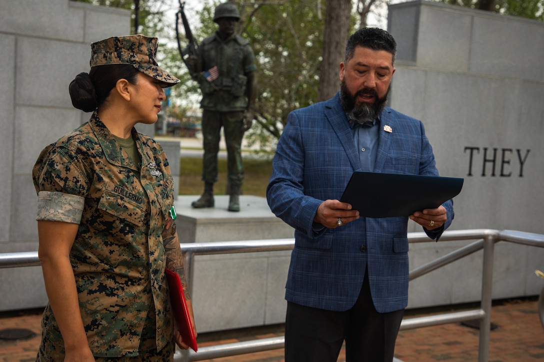 U.S Navy Petty Officer First Class Nancy Guillermo, a Queens, New York native with the 24th Marine Expeditionary Unit (MEU), is awarded the Geico Service Member of the Year award for the Navy at the Lejeune Memorial Gardens, Jacksonville, N.C., March 24, 2025. As the 24th MEU’s Religious Programs Specialist, Guillermo was awarded the GEICO Service Member of the Year for organizing and participating in multiple volunteer and community relation events, both on and off duty, during the pre-deployment training cycle and deployment. (U.S. Marine Corps photo by Cpl. Victoria Hutt)