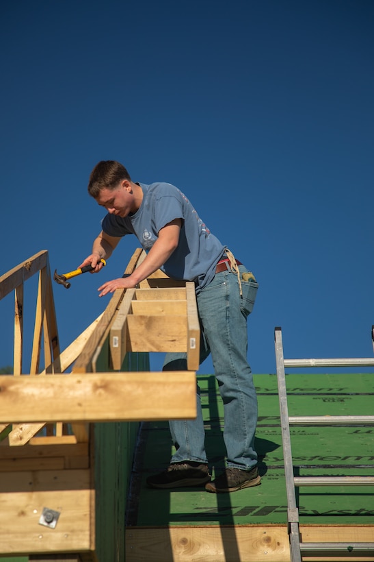 U.S. Marine Cpl. Robert Beall, an intelligence specialist with the 24th Marine Expeditionary Unit (MEU), volunteers with the Habitat for Humanity foundation in Wilmington, N.C., April 16, 2025. 24th MEU Marines and Sailors volunteer with different organizations to give back to local communities and build relationships. (U.S. Marine Corps photo by Cpl. Victoria Hutt)