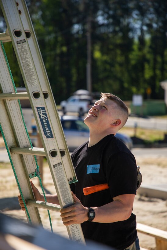 U.S. Marine Lance Cpl. John Bechtold, an intelligence specialist with the 24th Marine Expeditionary Unit (MEU), volunteers with the Habitat for Humanity foundation in Wilmington, N.C., April 16, 2025. 24th MEU Marines and Sailors volunteer with different organizations to give back to local communities and build relationships. (U.S. Marine Corps photo by Cpl. Victoria Hutt)