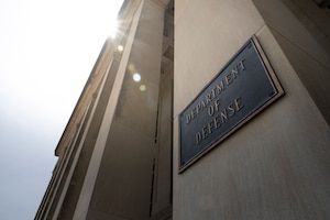A Department of Defense sign outside of the Pentagon.