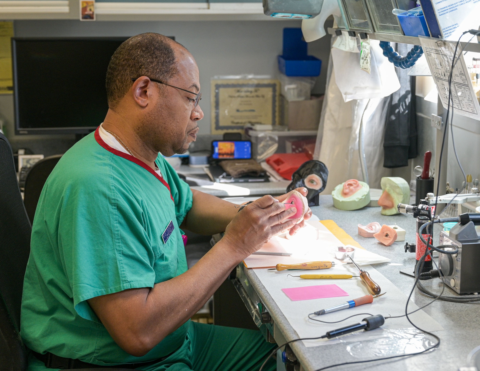 Medical professional making a mold.