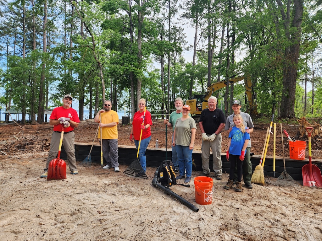 Volunteers cleaning up in a park