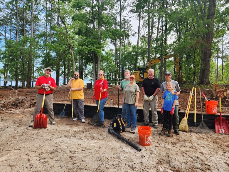 Volunteers cleaning up in a park