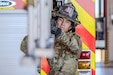 U.S. Army Cpl. Jalen Martinez, an Army Firefighter serving with the 664th modular ammunition company, 61st Quartermaster Battalion, 13th Armored Corps Sustainment Command, III Armored Corps, demonstrates various firefighting techniques, Nov. 20, 2024, Fort Cavazos, Texas. (U.S. Army photo by Sgt. Tanner Dibble)
