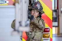 Army firefighter conducting training.
