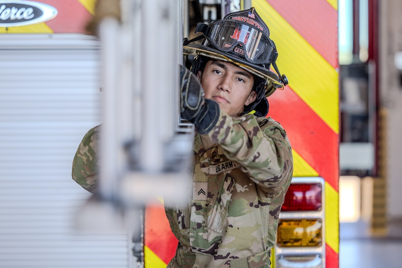 Army firefighter conducting training.