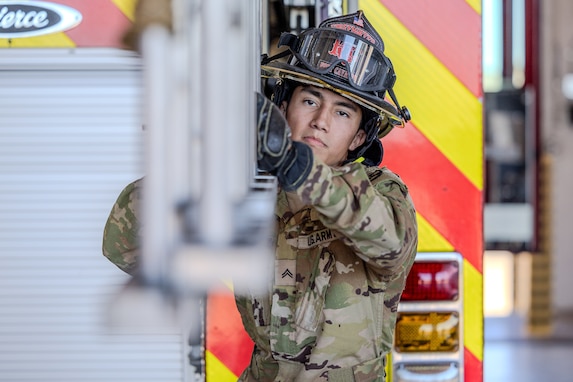 Army firefighter conducting training.