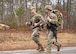 U.S. Air Force Airman 1st Class Elijah Harris, 104th Fighter Wing (FW) public affairs specialist, and Tech. Sgt Shane Coakley, 104th Security Forces, run during the Massachusetts National Guard 2025 Best Warrior Competition, Camp Edwards, Massachusetts, April 11, 2025. Harris represented the 104th FW while competing against members of the Air and Army National Guard, Kenya Defense Forces and Irish Defense Forces. (U.S. Air National Guard Photo by Melanie J. Casineau)