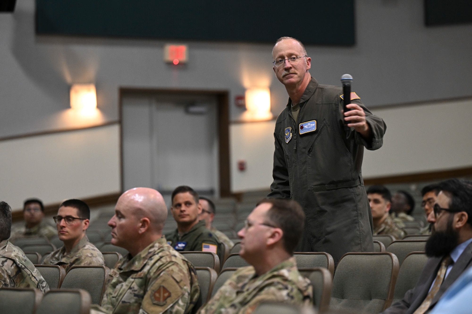 Senior Master Sgt. David Wagstaff, 89th Wing Staff Agencies senior enlisted leader, asked a question during the Understanding China’s Aerospace event at Joint Base Andrews, Md., April 21, 2025. The event featured a presentation and question-and-answer session with Dr. Brendan Mulvaney, director of the Department of the Air Force China Aerospace Studies Institute. (U.S. Air Force photo by Senior Airman Gianluca Ciccopiedi)