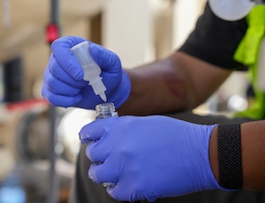A contractor with Navy Closure Task Force-Red Hill (NCTF-RH) tests a water sample from granular activated carbon filtration tanks connected to the Navy Aiea Halawa Shaft (NAHS) in Honolulu, April 14, 2025. The water samples were taken as part of a pilot study in preparation for the reactivation of the NAHS.  Charged with the safe decommissioning of the Red Hill Bulk Fuel Storage Facility, NCTF-RH was established by the Department of the Navy as a commitment to the community and the environment. NCTF-RH continues to engage with the people of Hawaii, regulatory agencies, and other stakeholders as it safely and deliberately decommissions the facility. (U.S. Navy photo by Mass Communication Specialist 1st Class Glenn Slaughter)