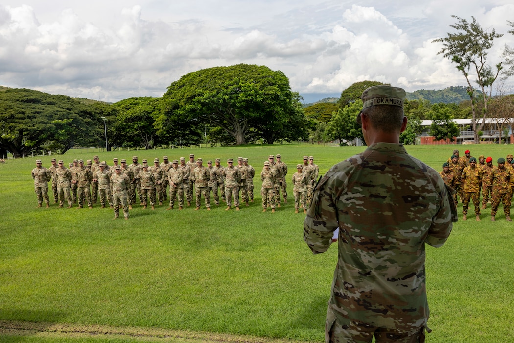 U.S. Army Maj. Gen. Lance Okamura, U.S. Army Pacific - Homeland Affairs, deputy commanding general, and Brig. Gen. Larry Opa, deputy commander of the Papua New Guinea Defense Force, gives a speech during the closing ceremony of Tamiok Strike 2025 in Port Moresby, Papua New Guinea, April 25, 2025.