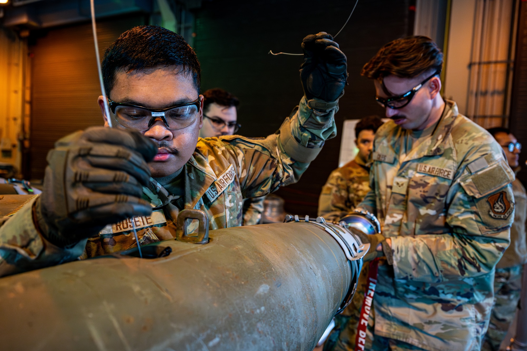 Airmen assemble a bomb