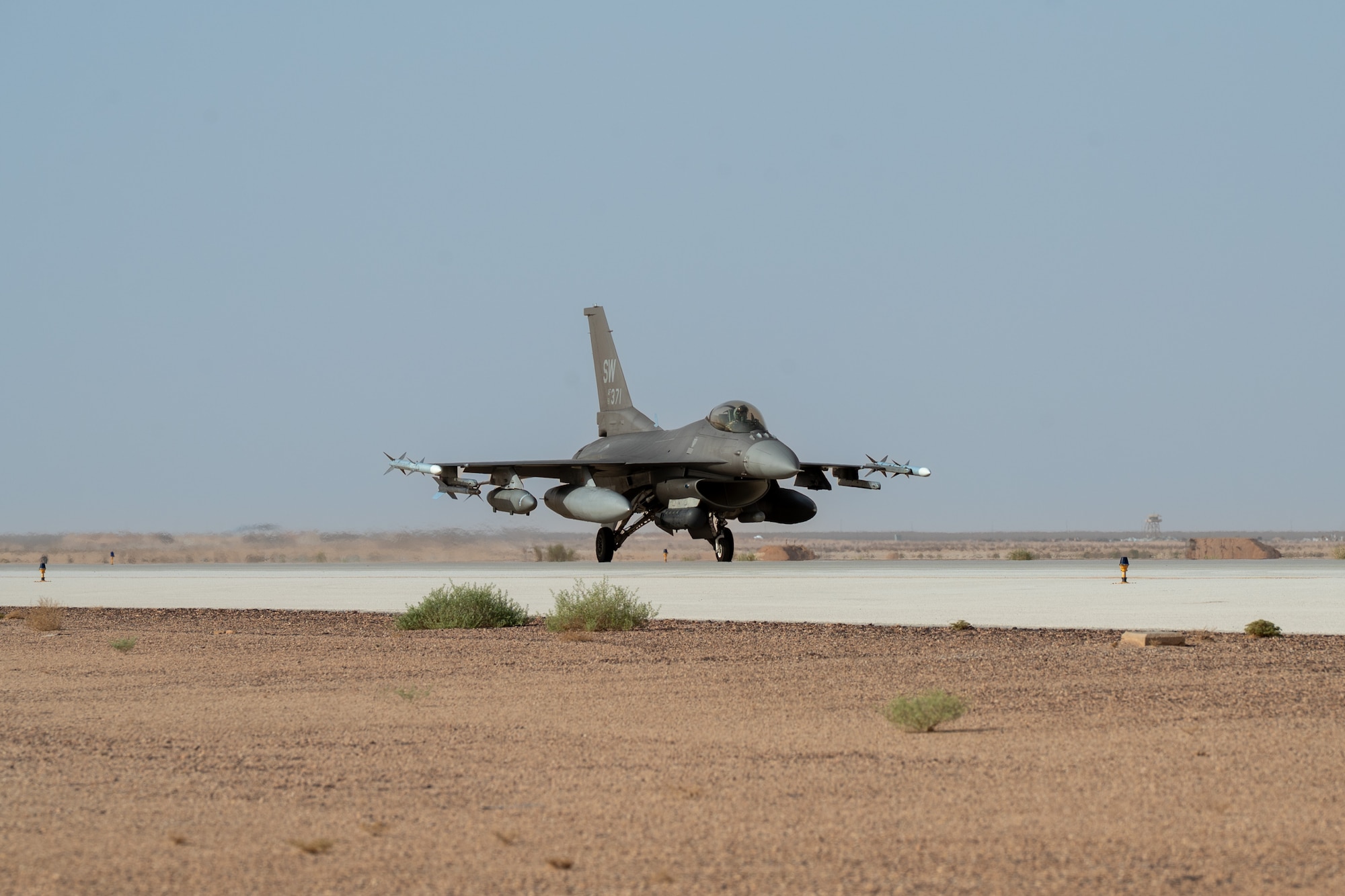 An F-16 Taxis on a runway