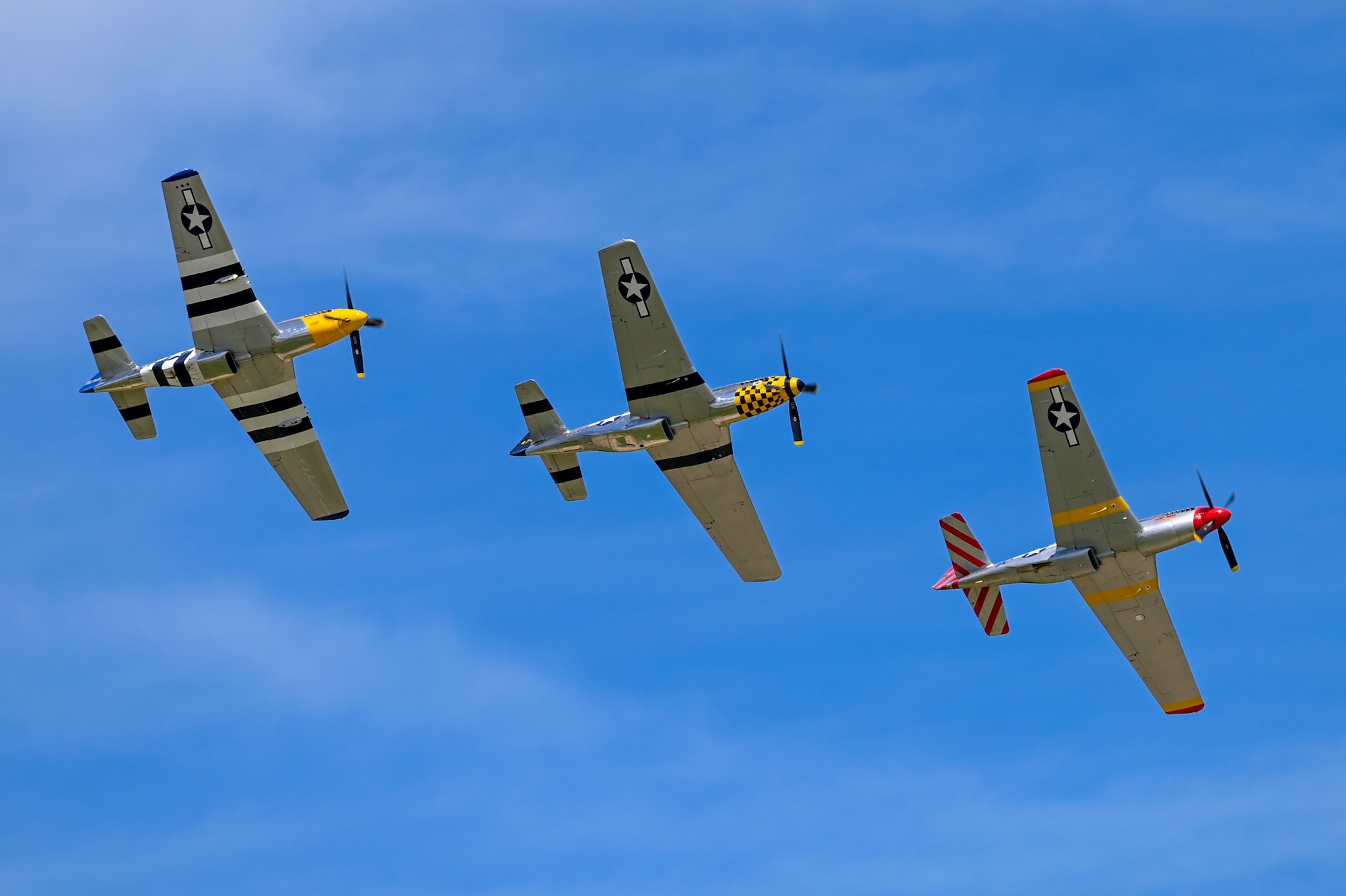 Three planes fly in a line.