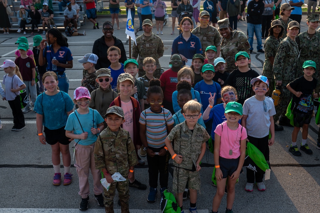 2025 Operation KIDS participants prepare for their mock deployment at the Vance Deployment Center, Goodfellow Air Force Base, Texas, April 26, 2025. Op KIDS provided an opportunity for children from the base and local communities to familiarize themselves with activities commonly found at deployed locations. (U.S. Air Force photo by Airman 1st Class James Salellas)
