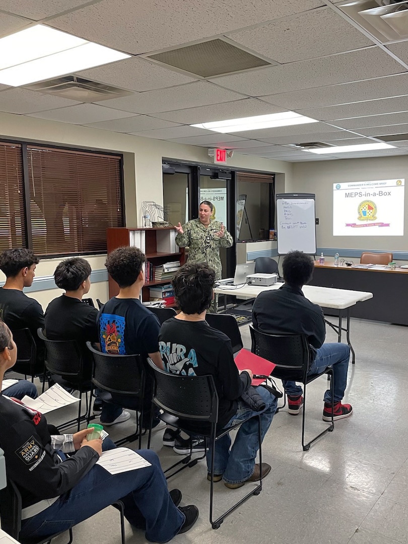 Navy Chief Petty Officer Taylor Guzma, Dallas MEPS operations non-commissioned officer in charge, briefs applicants before processing at the first "MEPS in a Box." USMEPCOM launched the mobile "MEPS in a Box" initiative with a pilot in Austin, Texas, April 28-30, to provide full-service applicant processing in underserved areas and expand recruiting capacity.