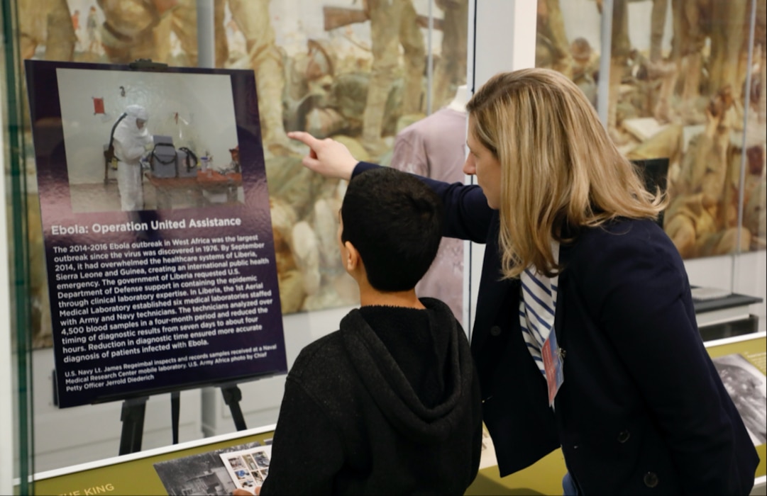 SILVER SPRING, Md. (25 April, 2025) Dr. Jill Phan, Naval Medical Research Command (NMRC) science director, explains technology used by the command to conduct research on behalf of service members to visitors at the National Museum of Health and Science’s Military Medical Innovation event. NMRC, headquarters of Navy Medicine Research & Development, is engaged in a broad spectrum of activity from basic science in the laboratory to field studies in austere and remote areas of the world to investigations in operational environments. In support of Navy, Marine Corps and joint U.S. warfighter health, readiness and lethality, researchers study infectious diseases, biological warfare detection and defense, combat casualty care, environmental health concerns, aerospace and undersea medicine, operational mission support and epidemiology. For 250 years, Navy Medicine, represented by more than 44,000 highly-trained military and civilian healthcare professionals, has delivered quality healthcare and enduring expeditionary medical support to the warfighter on, below, and above the sea and ashore. (U.S. Navy photo by Sidney Hinds /Released)