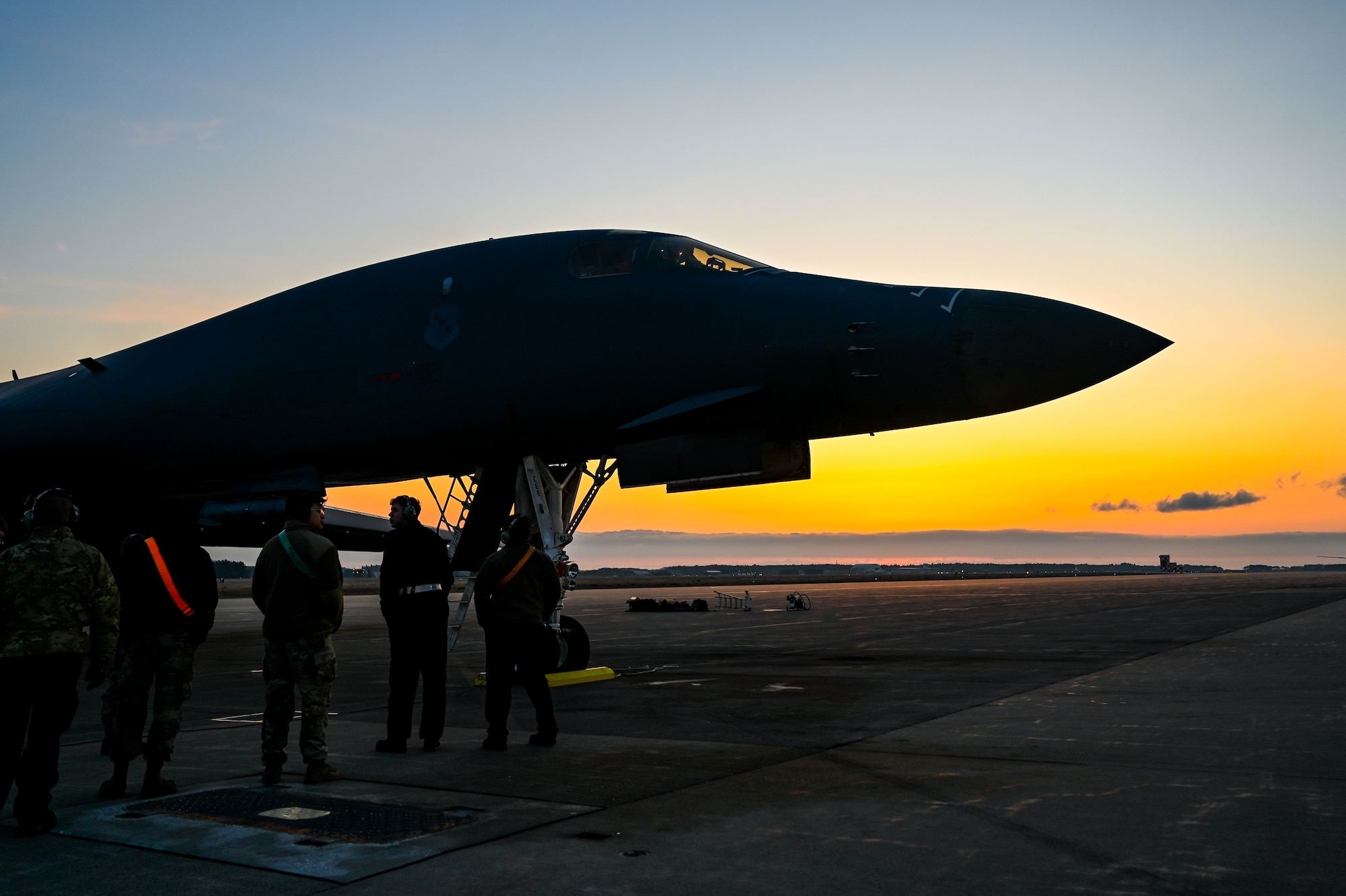 aircrew prepare to board a B-1B airplane
